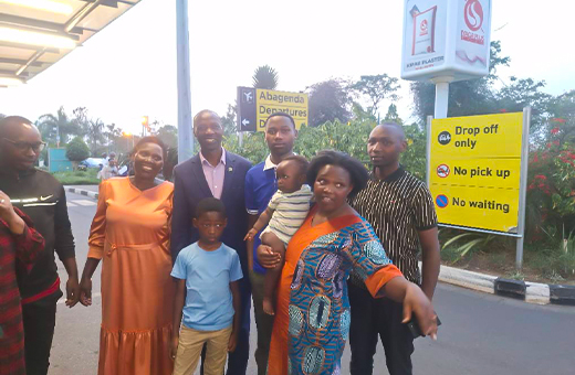 Parents and students at Kigali International Airport